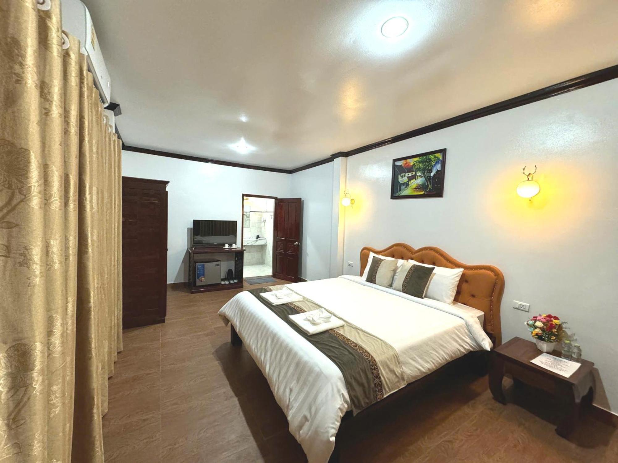 Win Hotel Vang Vieng Buitenkant foto