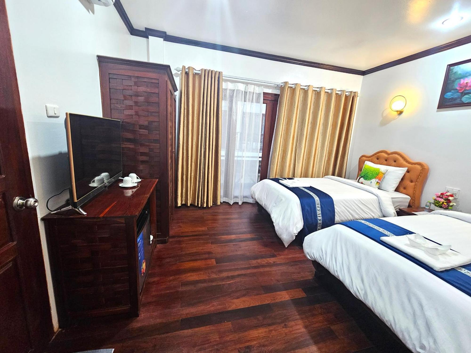 Win Hotel Vang Vieng Buitenkant foto