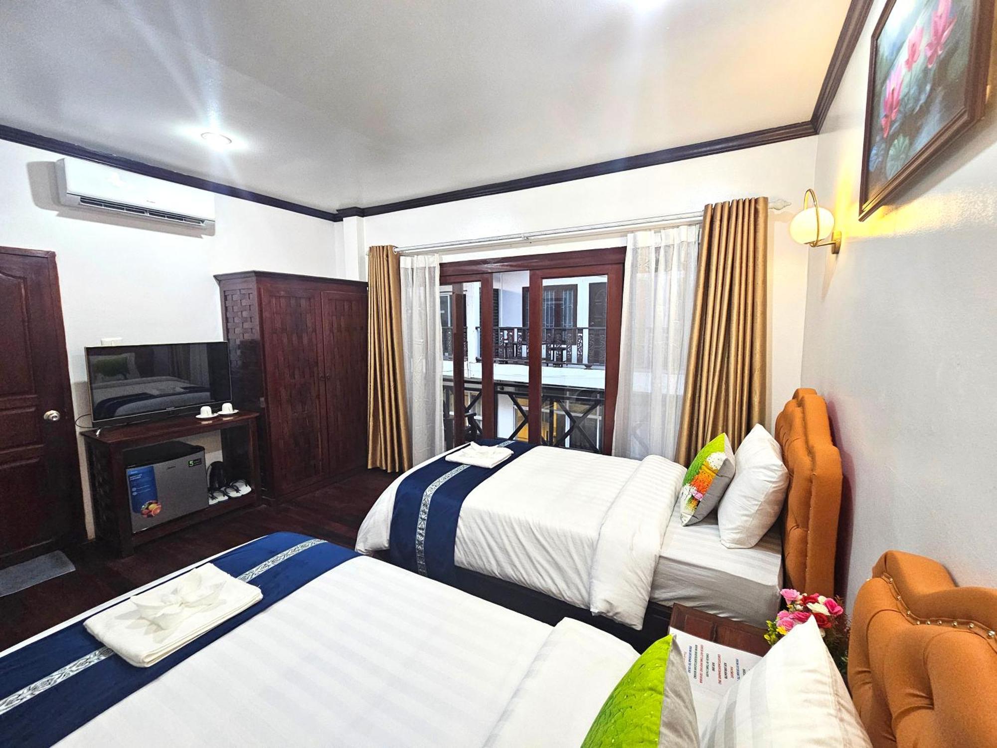 Win Hotel Vang Vieng Buitenkant foto