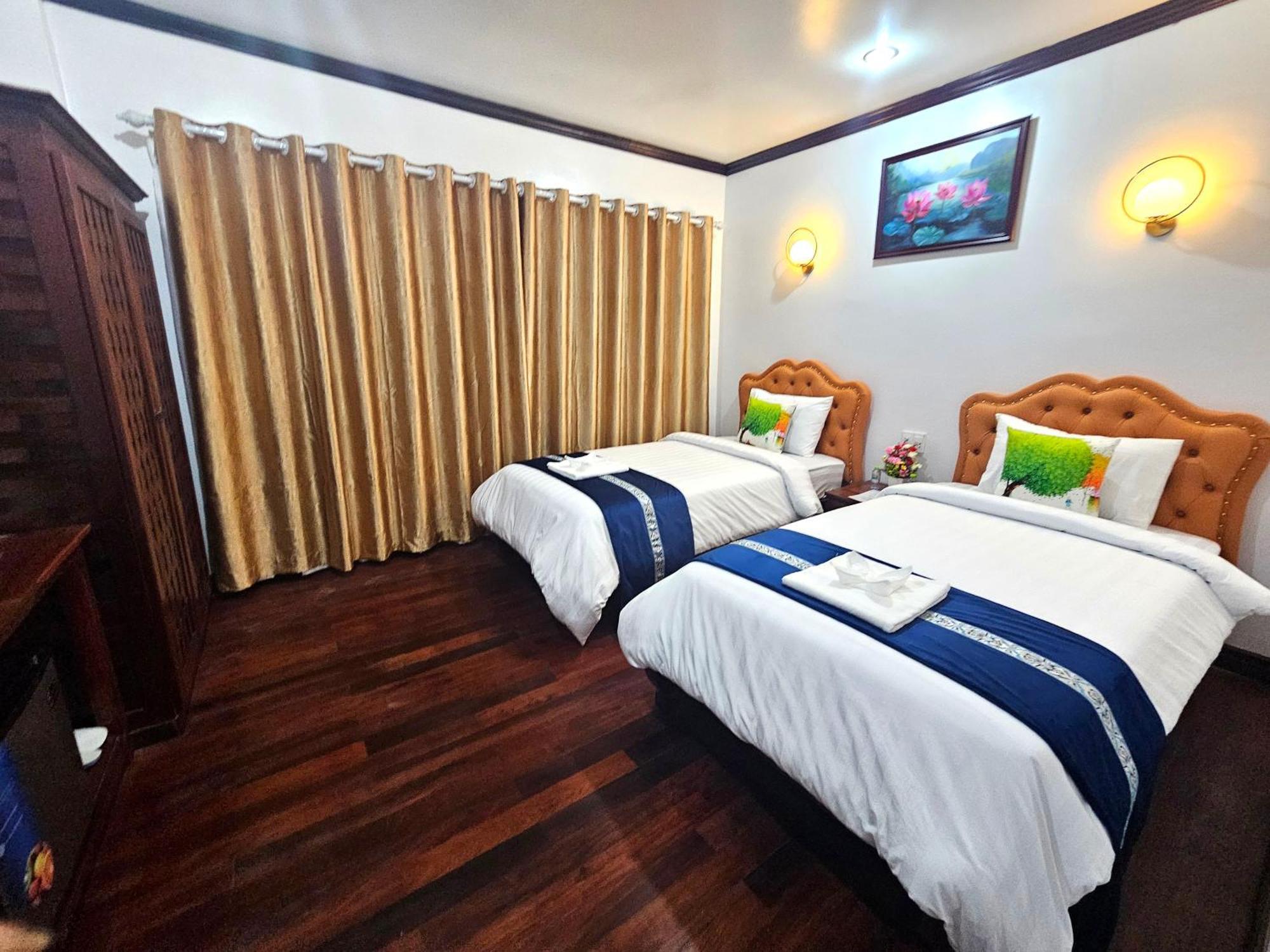 Win Hotel Vang Vieng Buitenkant foto