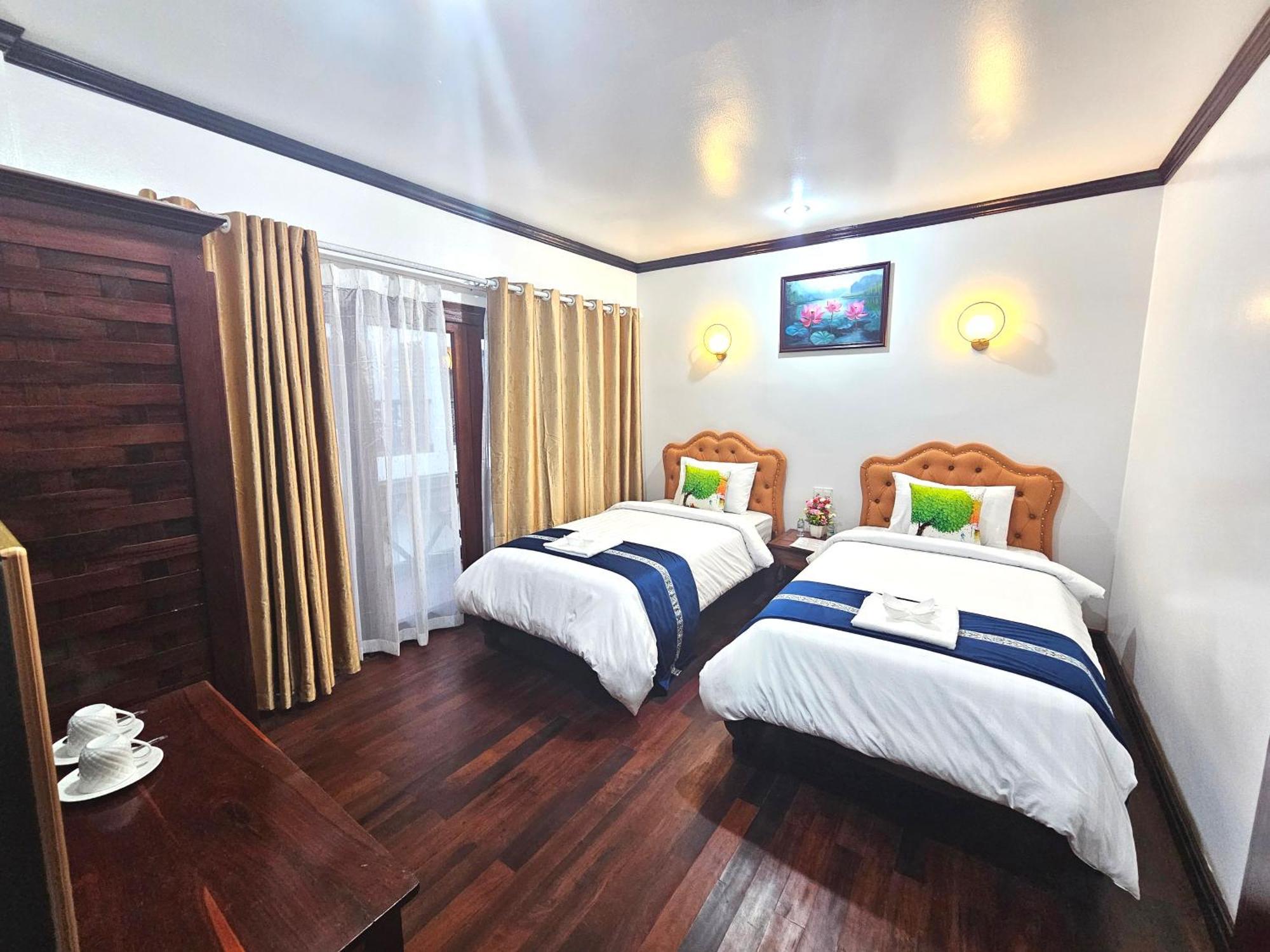 Win Hotel Vang Vieng Buitenkant foto