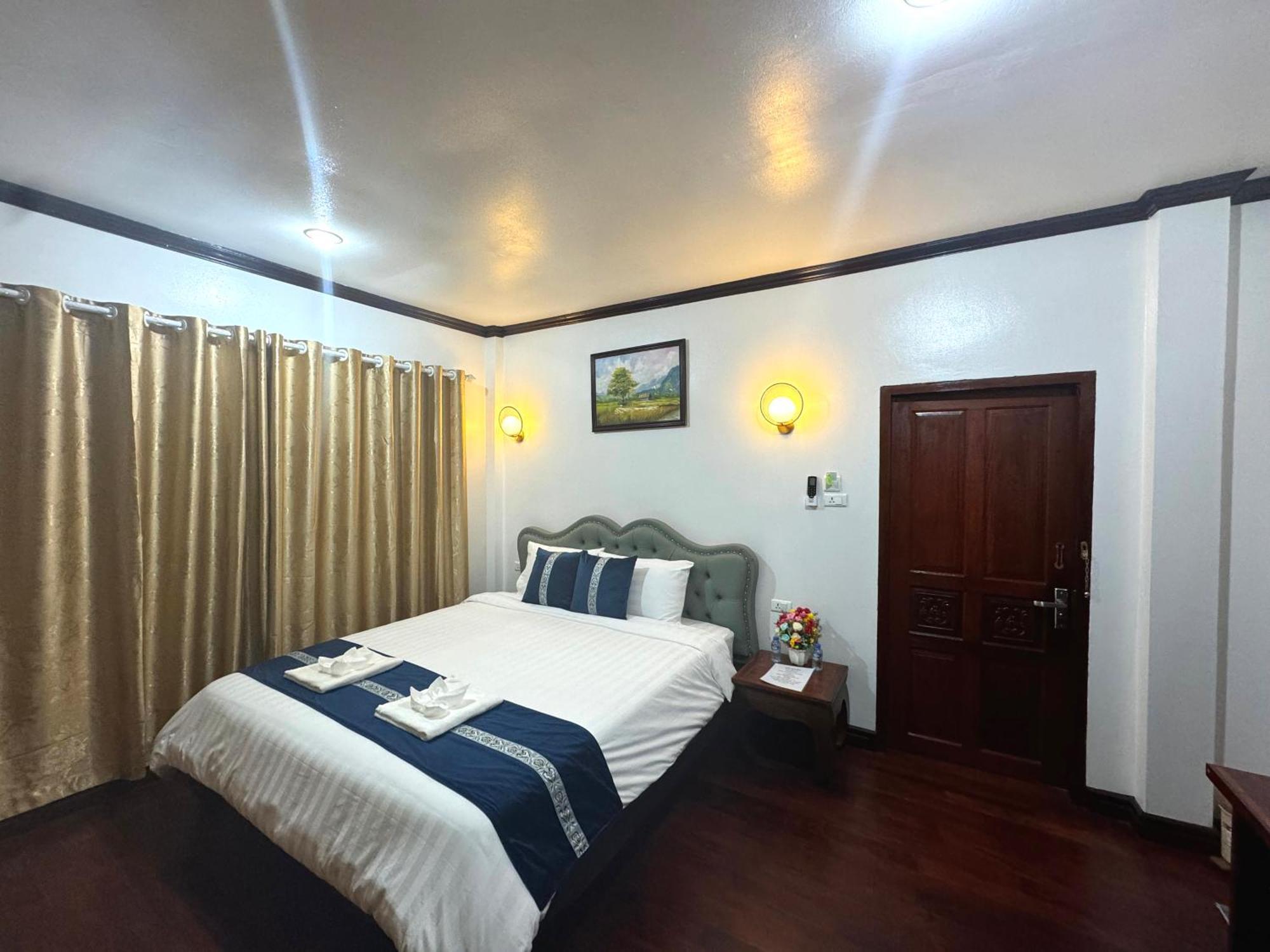 Win Hotel Vang Vieng Buitenkant foto