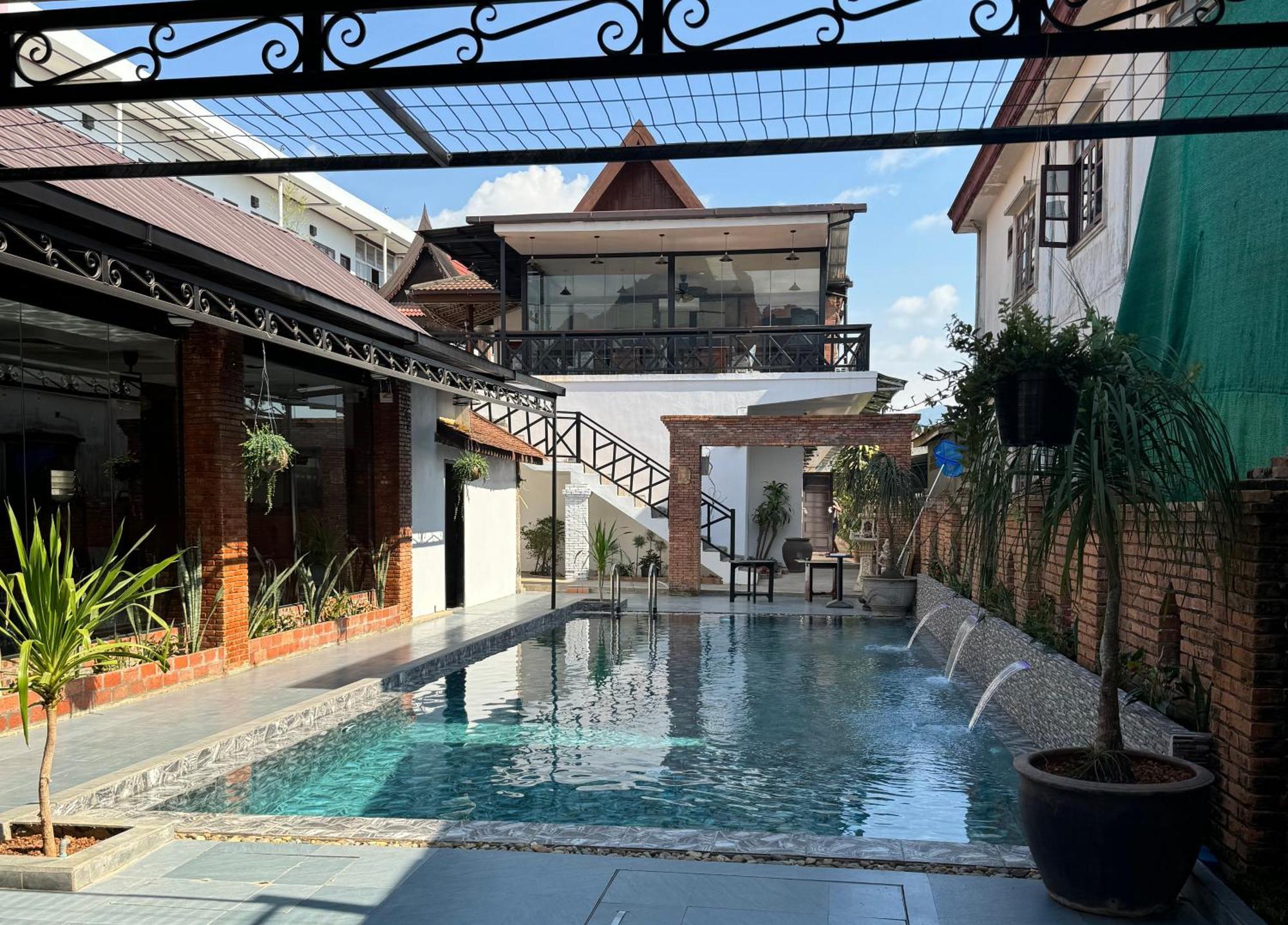Win Hotel Vang Vieng Buitenkant foto