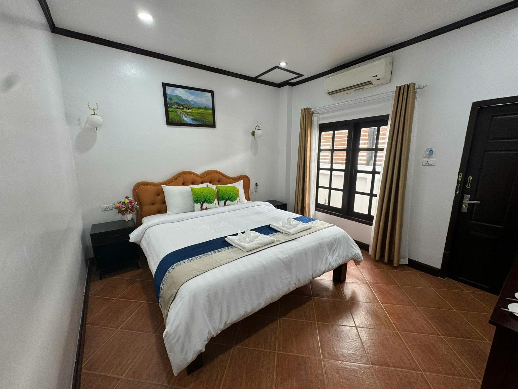 Win Hotel Vang Vieng Buitenkant foto