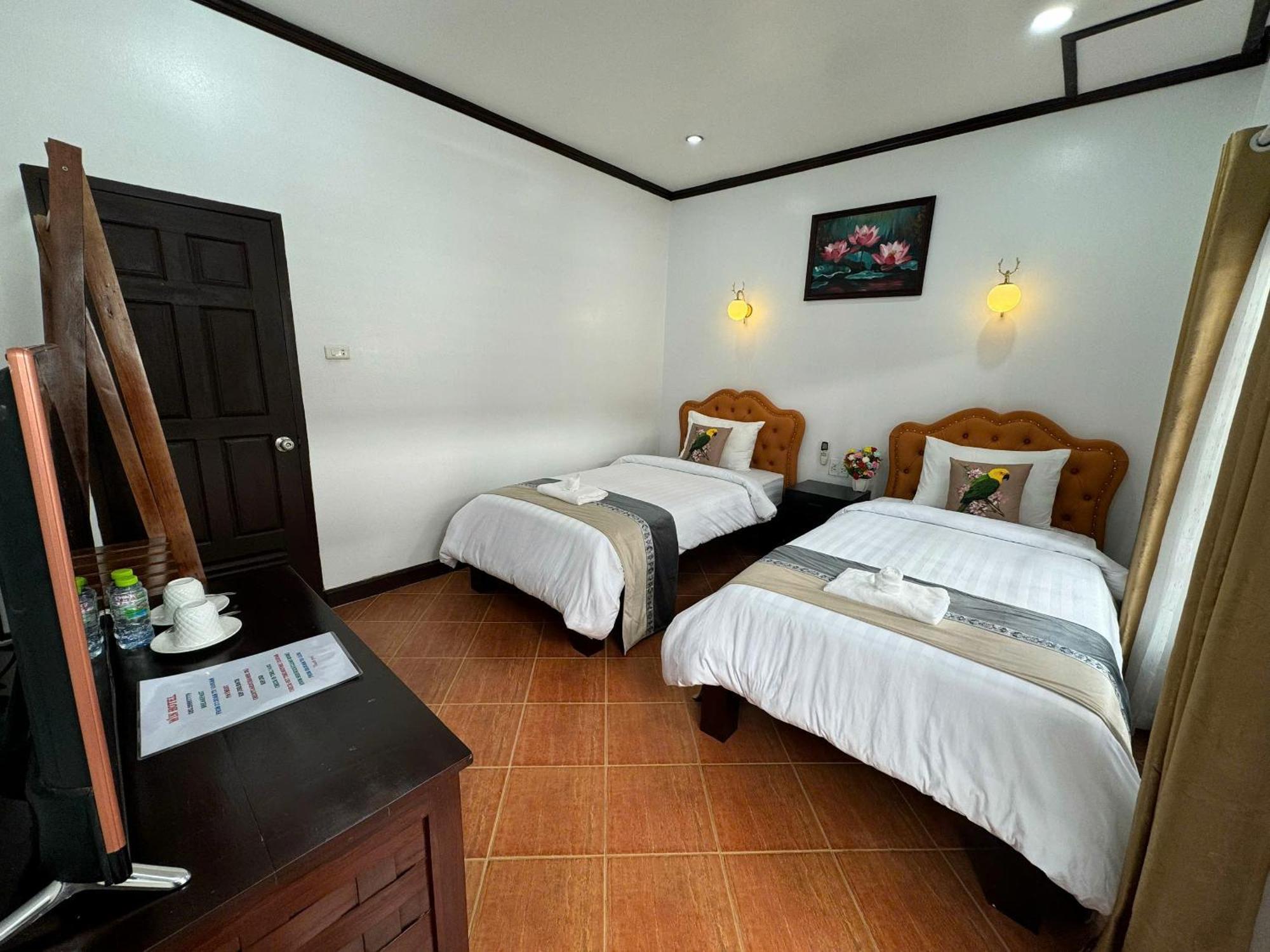 Win Hotel Vang Vieng Kamer foto